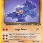 Dark Machamp (27/82) – Team Rocket Unlimited - Shop Now
